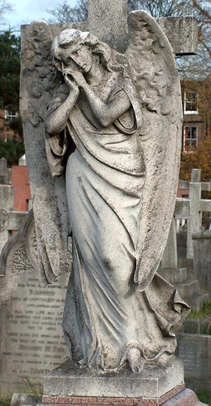 old weeping angel statue